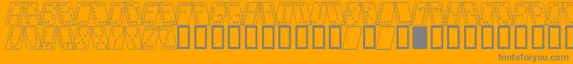 Domino o-fontti – harmaat kirjasimet oranssilla taustalla