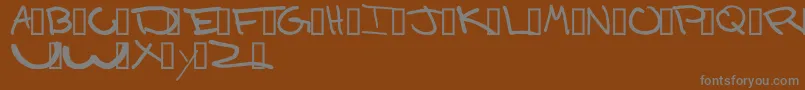 DONALD Font – Gray Fonts on Brown Background