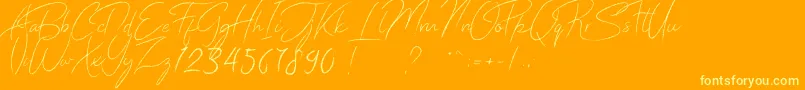 Donatella-Schriftart – Gelbe Schriften auf orangefarbenem Hintergrund