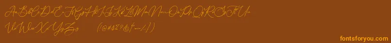 Шрифт Donatellia Demo – оранжевые шрифты на коричневом фоне