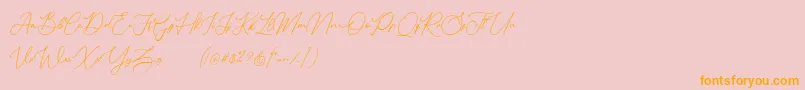 Donatellia Demo-Schriftart – Orangefarbene Schriften auf rosa Hintergrund