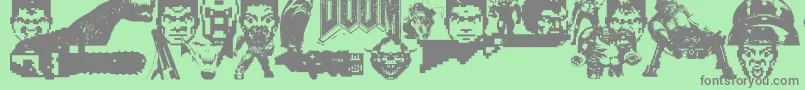 Więcej informacji o czcionce Doom And Gloom Czcionka Doom And Gloom – szare czcionki na zielonym tle