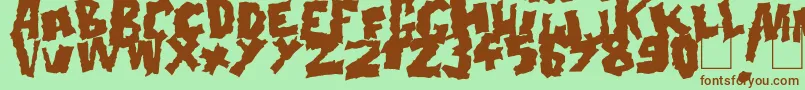 Doonga Black-fontti – ruskeat fontit vihreällä taustalla