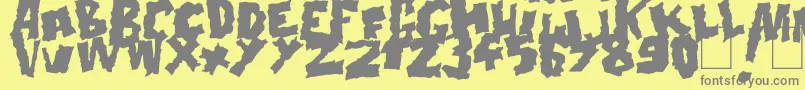Doonga Black-fontti – harmaat kirjasimet keltaisella taustalla