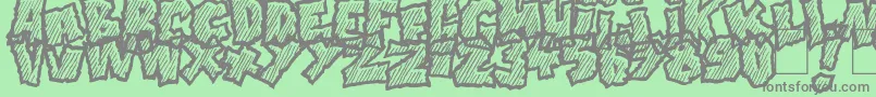 Doonga Slash Font – Gray Fonts on Green Background