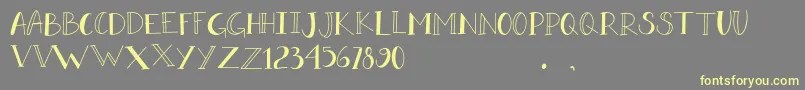 DORA DORE Font – Yellow Fonts on Gray Background