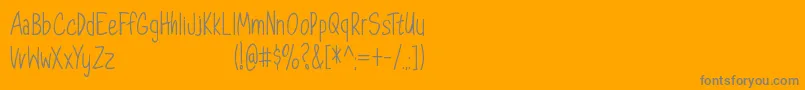 Dorathy   Personal Use Only-Schriftart – Graue Schriften auf orangefarbenem Hintergrund