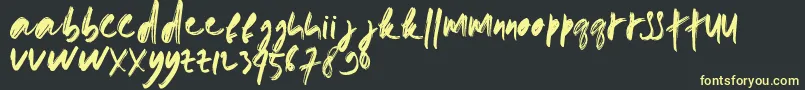 doremi brush-Schriftart – Gelbe Schriften auf schwarzem Hintergrund