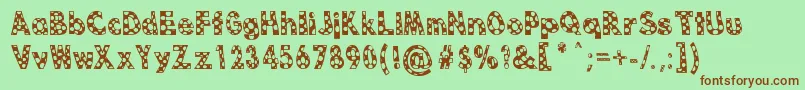 Dottie B MacSpotter Font – Brown Fonts on Green Background