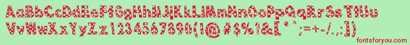 Dottie B MacSpotter Font – Red Fonts on Green Background