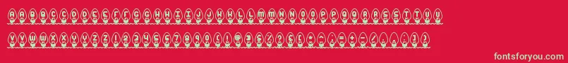 Fonte XmasLightsBrk – fontes verdes em um fundo vermelho