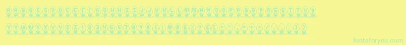 XmasLightsBrk Font – Green Fonts on Yellow Background