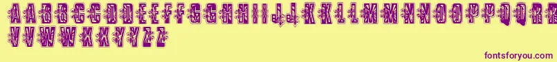 VtksLowriderbox Font – Purple Fonts on Yellow Background