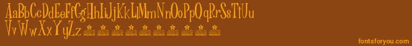 Шрифт Dr Phibes Personal Use – оранжевые шрифты на коричневом фоне