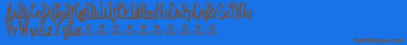 Czcionka Dr Phibes shadow Personal Use – brązowe czcionki na niebieskim tle