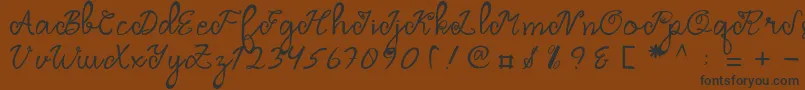 Dragonfly Script Font – Black Fonts on Brown Background