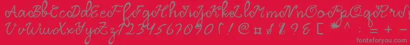 Fonte Dragonfly Script – fontes cinzas em um fundo vermelho