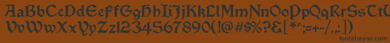 Vinque-Schriftart – Schwarze Schriften auf braunem Hintergrund