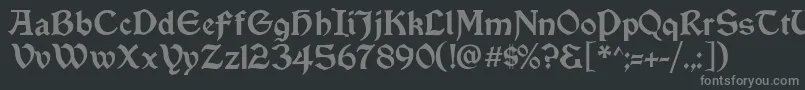 Vinque-fontti – harmaat kirjasimet mustalla taustalla