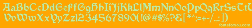 Vinque Font – Green Fonts on Orange Background