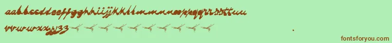 DRAGONFLY-Schriftart – Braune Schriften auf grünem Hintergrund