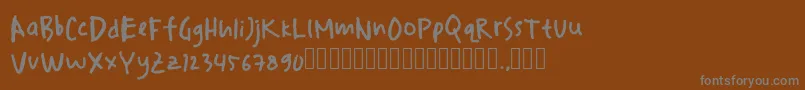 Шрифт drawersketches – серые шрифты на коричневом фоне