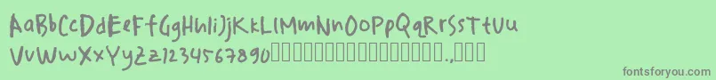 Czcionka drawersketches – szare czcionki na zielonym tle