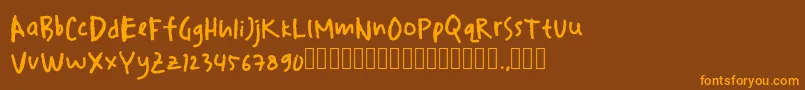 drawersketches Font – Orange Fonts on Brown Background