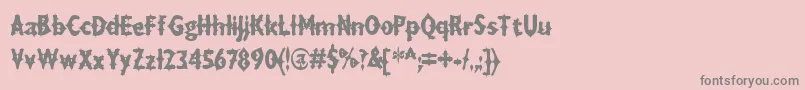 DRAXLA  -fontti – harmaat kirjasimet vaaleanpunaisella taustalla