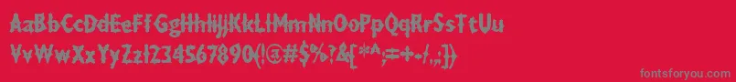 DRAXLA  -Schriftart – Graue Schriften auf rotem Hintergrund