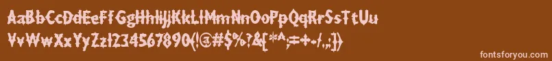 DRAXLA  -fontti – vaaleanpunaiset fontit ruskealla taustalla