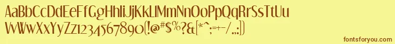 フォントdream orphans – 茶色の文字が黄色の背景にあります。