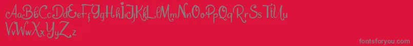 Dream Unicorn-Schriftart – Graue Schriften auf rotem Hintergrund