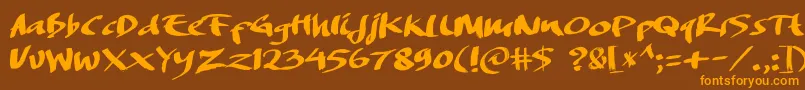 Lisätietoja DREAMERS BRUSH-fontista DREAMERS BRUSH-fontti – oranssit fontit ruskealla taustalla