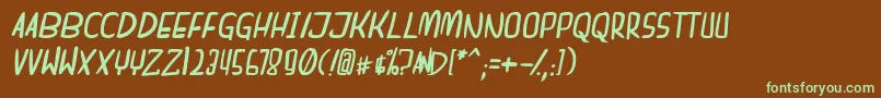フォントdreamgirl bitallic – 緑色の文字が茶色の背景にあります。