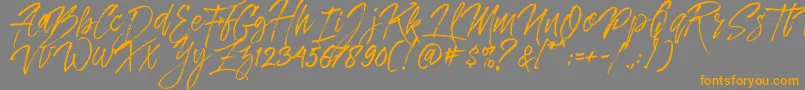 Шрифт Dreamlight Typeface Free Demo – оранжевые шрифты на сером фоне