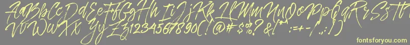 Dreamlight Typeface Free Demo-Schriftart – Gelbe Schriften auf grauem Hintergrund