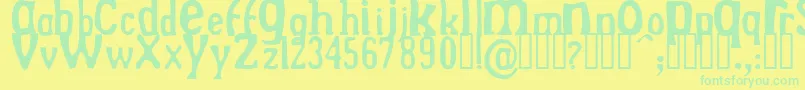 fuente DREKN    – Fuentes Verdes Sobre Fondo Amarillo