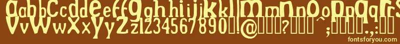 DREKN   -fontti – keltaiset fontit ruskealla taustalla