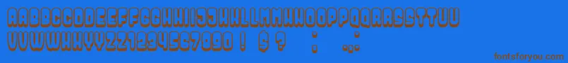 Dressed Font – Brown Fonts on Blue Background