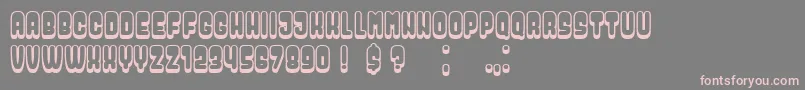 フォントDressed – 灰色の背景にピンクのフォント