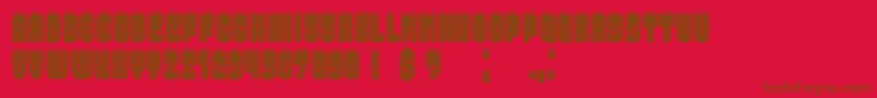 Więcej informacji o czcionce DressedFilled Czcionka DressedFilled – brązowe czcionki na czerwonym tle