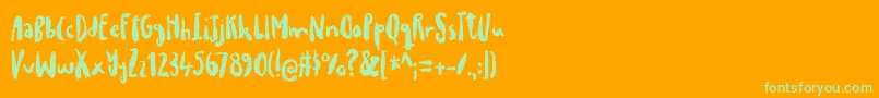 drillepindDEMO-Schriftart – Grüne Schriften auf orangefarbenem Hintergrund