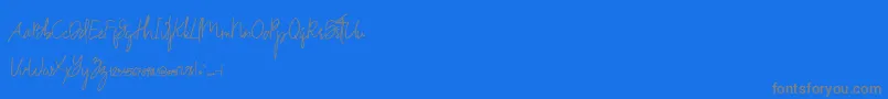 Fonte Drinkwater Demo – fontes cinzas em um fundo azul
