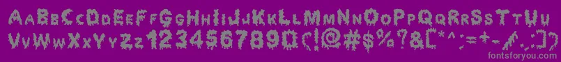 Fonte Dripping Horror – fontes cinzas em um fundo violeta
