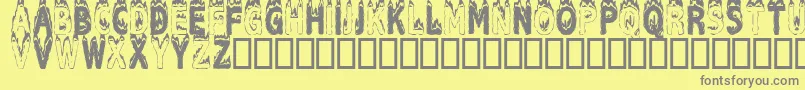 フォントPlastic – 黄色の背景に灰色の文字