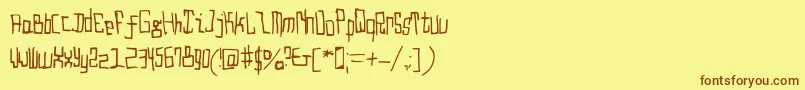 フォントDroido Medium – 茶色の文字が黄色の背景にあります。