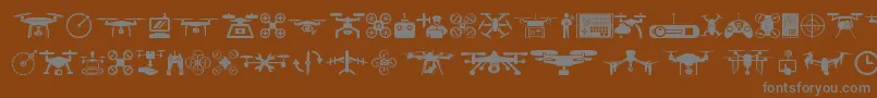 drone-Schriftart – Graue Schriften auf braunem Hintergrund