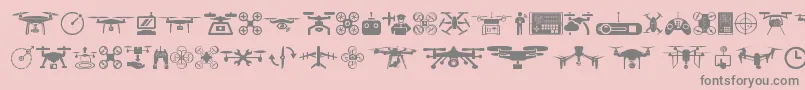 drone-fontti – harmaat kirjasimet vaaleanpunaisella taustalla