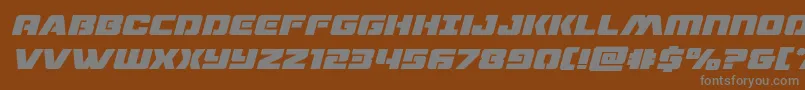 dronetrackerboldital-fontti – harmaat kirjasimet ruskealla taustalla